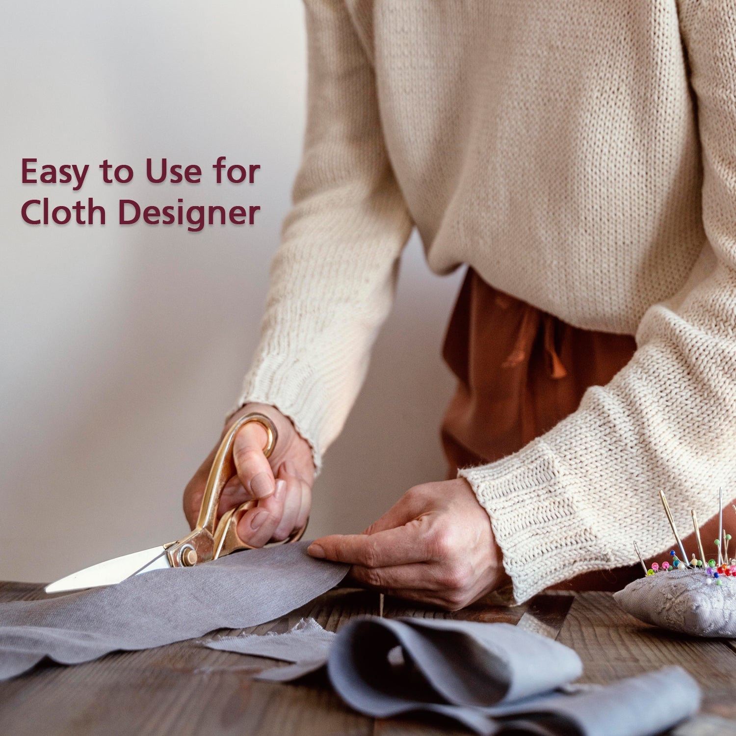 Professional tailoring scissors with ergonomic handle for precise cutting.